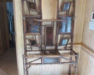 Offered at $1600. Bamboo Aesthetic Movement Hall Tree. Mirror has been replaced. Asian motif. 19th Century Aesthetic Movement. (35.5"w x 11.5"d x 82"h) ~ Please send inquiries via text to 251.525.0966 and reference the photo number.
