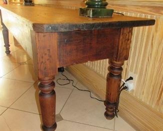 Offered at $3600.  French scrubbed Pine work table, most likely used for meat grinding, cutting and curing. Beautiful patina with wide board top, scrubbed pine top, and large turned legs. A handsome and unique look with interesting distress and real design presence. c. 1860 (26.5"w x 95.25"l x 31.5"h) ~ Please send inquiries via text to 251.525.0966 and reference the photo number.  