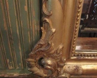 Offered at $4000. A beautiful and elegant early French 19th century carved wood mirror. Approx. 1840. Some repairable gesso issues. (52"w x 71"h) ~ Please send inquiries via text to 251.525.0966 and reference the photo number.