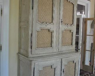 Offered at $3000. French Pine 19th Century two part cupboard. Hardware is not unique to this piece. Scallop cut shelving. The cabinet has been white washed or limed. A stunning and sturdy piece for the era. (59.75"w x 28.25"d x 102.5"h) ~ Please send inquiries via text to 251.525.0966 and reference the photo number.