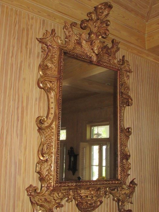 Offered at $6900.  French gilt carved wood mirror with cherub and "winds of time" carvings. Approx. 1790 era. Some slight cracking expected with age of piece, and easily repairable. (84" x 52") ~ Please send inquiries via text to 251.525.0966 and reference the photo number. 