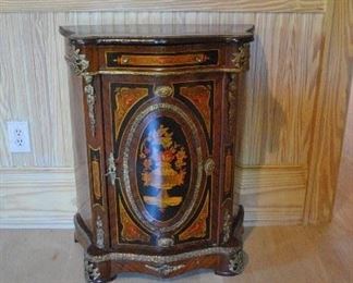 Offered at $3000. Pair of Matching Marquetry cabinets. In style of Napoleon III. Circa 1800s. (25"w x 12.25"d x 31.75"h) ~ Please send inquiries via text to 251.525.0966 and reference the photo number.