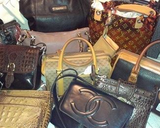 Brand name handbags: Chanel, L. Vuitton, Coach, Brahmin, Gucci, Dooney Bourke, Michael Kors, Calvin Klein, Chico...