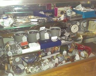 Smalls: Swarovskis, clocks, sterling, perfume bottles, MOP binoculars, etc.- just think how long it took to arrange