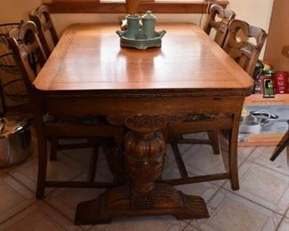BEAUTIFUL ANTIQUE/VINTAGE WOOD TABLE W/SELF STORING EXTENSIONS & 4 CHAIRS