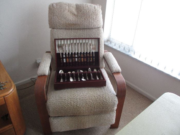 Recliner and silver plate flatware