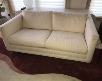 white loveseat 1 of 2