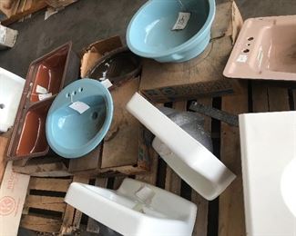 Vintage copper brown kitchen sinks and regency blue sinks. White cast iron sinks. 