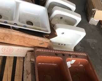 Vintage copper brown kitchen sinks, white, and regency blue sinks.