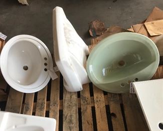 White and bayberry-avocado sinks.