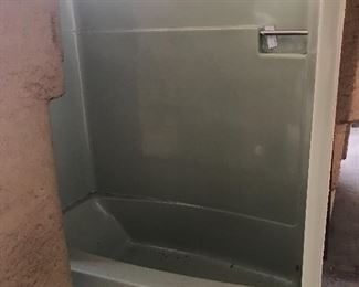 Shower/bathtub stall in white and avocado colors