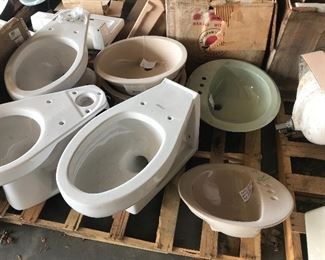 Many options of toilets and sinks