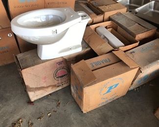 An old model of American Standard toilets