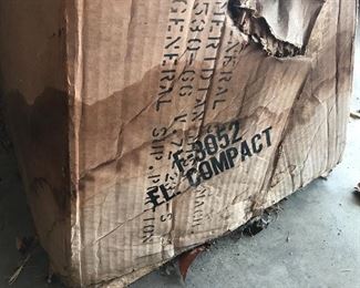An old model of American Standard toilets from many decades ago still in the box never used