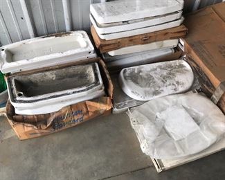 Toilet reservoir lids of many different models and ages