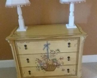 Painted chest with a pair of matching lamps