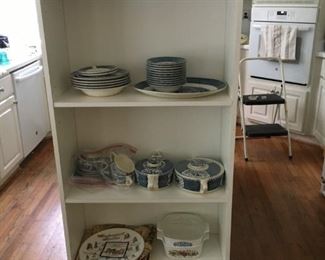 Shelves of dish sets.