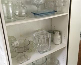 Beautiful cut glass bowls, covered candy dishes.