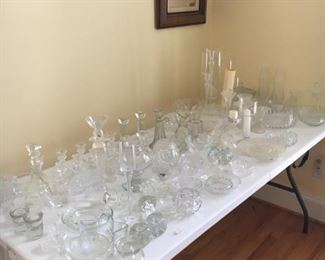 So many crystal candle holders and assorted items.