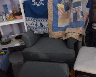 Country style chair with matching ottoman.  Antique quilt.