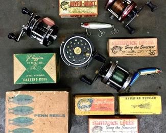 Vintage fishing lure boxes and reels