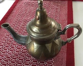 Vintage tea pot with silver and copper inlaid designs