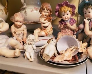 Collection of Porcelain Dolls and Figurines
