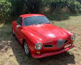1967 Volkswagen (VW) Karmann Ghia 2-door hardtop vin:147421747 According to the seller, the engine was replaced shortly after the vehicle was purchased. The car has not been used this season, but did start with a jump. Once started, it ran smoothly. It was driven to its current location earlier in the season.
Odometer reads 14411 but may not be functional. The sellers had stated that they averaged 1000-1500 miles a year on the car.
The car appears it had been previously repainted. There is a primer spot on the front bonnet that needs paint. There is no visible rust, but we were not able to examine the underside of the body.
Tire tread looks good with even wear.
There is a limited opportunity to inspect this vehicle. It is located in Manitou Springs, Colorado, and is kept under a car cover.