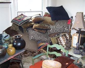 A PILE OF DECORATOR PILLOWS