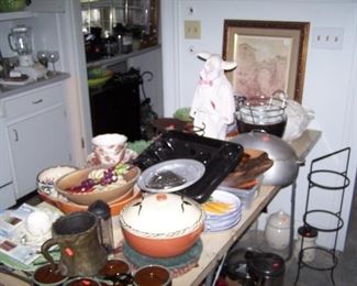 A TABLE OF KITCHEN ITEMS