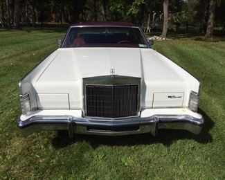 1977 Lincoln Continental. VIN: 7Y82A967494. Mileage:84,794. 365 bhp 8-cyl. 400cid/179hp 2bbl. Running and currently registered. Summer driven only, stored in garage during winter. 2nd owner of vehicle, from the collection of Paul Least, Lakeville, NY.