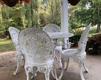 white table chairs outdoor