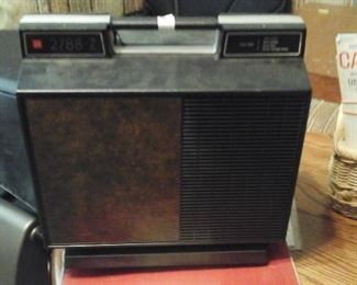 8 mm movie projector and screen