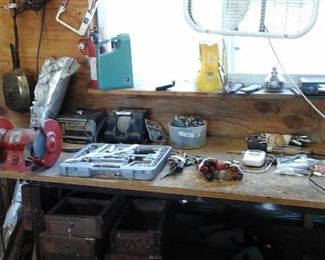 some hand tools, bench grinder