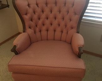 There is a pair of these diamond-tufted Accent Chairs. 