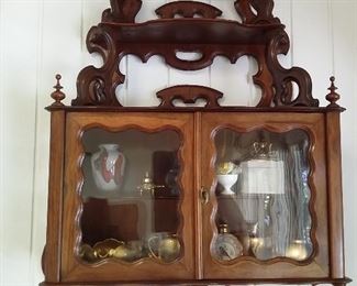 Antique wall shelf with ornate carving