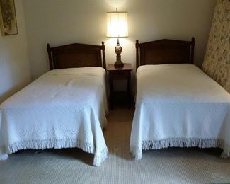 Twin beds with vintage headboards