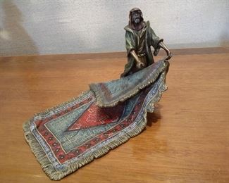 Bronze figure of a carpet seller by Franz Bergman
