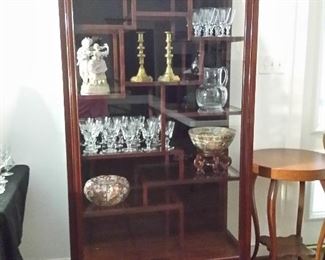Lighted mahogany curio cabinet