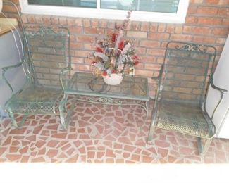 Many wrought iron patio pieces