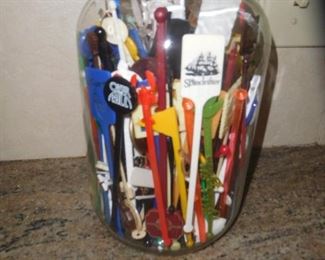 Gallon jar of vintage swizzle sticks