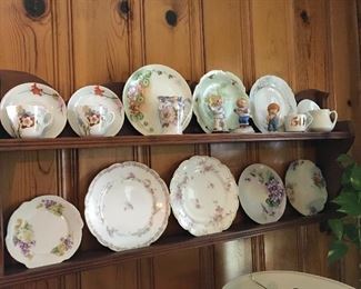 Lovely German and Austria and Haviland plates. Love the wooden shelf.