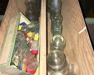 Vintage bottles and more. Insulators and multiple tool containers. Sold.