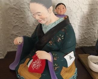 
VINTAGE JAPANESE CLAY HAKATA URASAKI DOLL
‘WOMAN with BABY, SEWING
