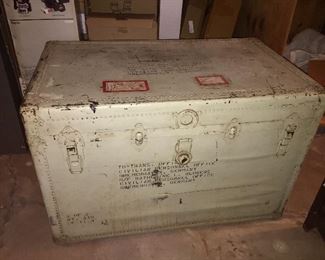 well-used travel trunk