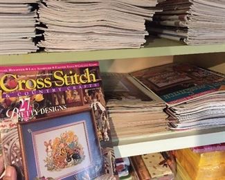 Many past issues of Cross Stich magazine, National Parks & Colonial Williamsburg