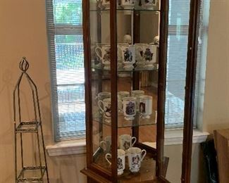 Nice Collection of Norman Rockwell Cups in Lighted Curio