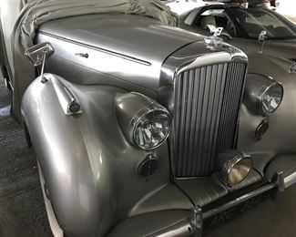 Bentley - approx 50,000 mi and asking $50,000   British steering.