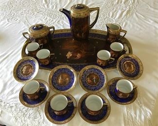 czechoslovakian demitasse set with tray.  religious pictures.   $350.   some pieces are marked with behive.