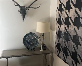 Statement deer skull and rack, kind of steals the show